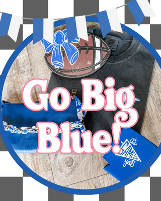Black shirt with blue accents and 'Go Big Blue!' text on a checkered background