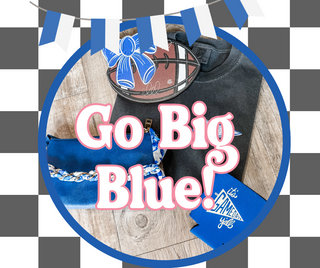 Black shirt with 'Go Big Blue!' text on a checkered background