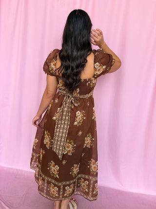 Girl wearing a brown dress