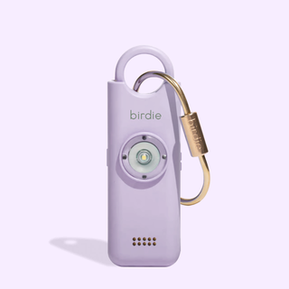 Purple device with a gold carabiner on a light purple background