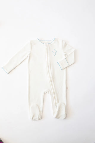 Baby onesie with a cross design on a white background