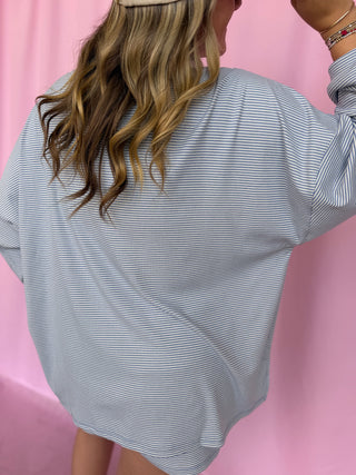 girl wearing a striped set 
