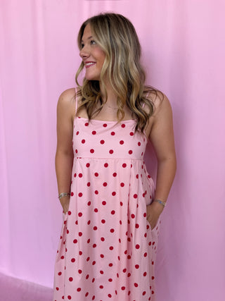 girl wearing a polka dot dress