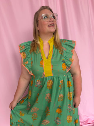 woman wearing green dress