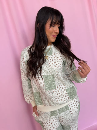 girl wearing a quilted set