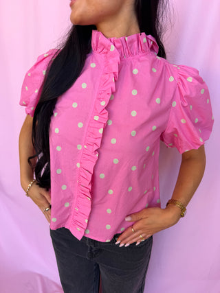 woman wearing polka dot top