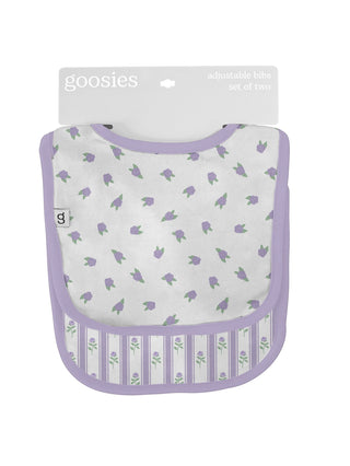 Baby bib with bird pattern in packaging on a white background