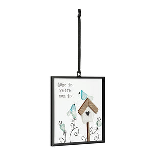 Decorative hanging sign with birds and a birdhouse, featuring the text 'home is where mom is'.