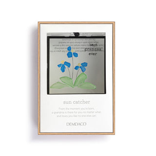 Framed artwork with blue flowers and text on a white background