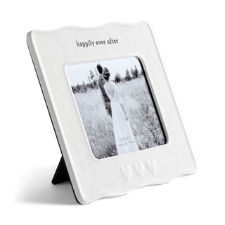 White photo frame with 'happily ever after' text and a black and white photo of a couple.