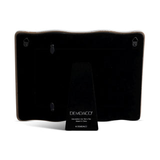 Black decorative item with DEMDACO branding on a white background