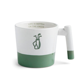 Green and white mug with golf-themed design on a white background