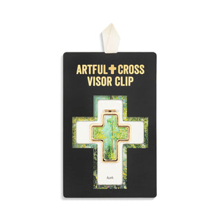 Artful Cross Visor Clip packaging with cross design on a white background