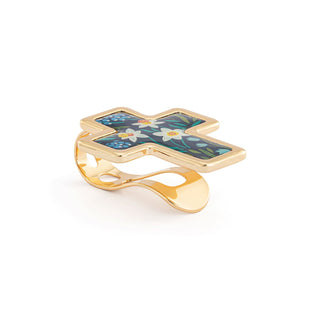 Gold cross-shaped ring with floral design on a white background