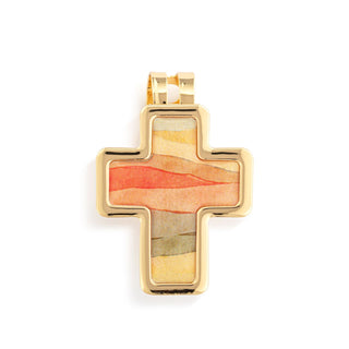 Gold cross pendant with a multicolored center on a white background