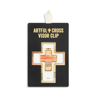 Artful Cross visor clip in packaging on a white background