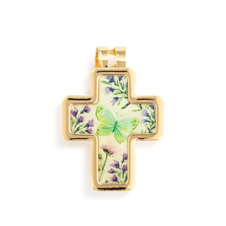 Gold cross pendant with floral and butterfly design on a white background