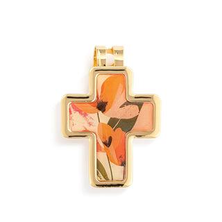 Gold cross pendant with floral design on a white background