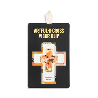 Artful Cross Visor Clip packaging with cross design and text on a white background