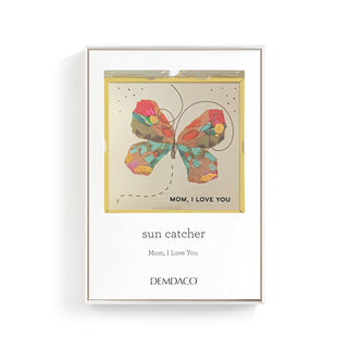 Framed artwork with a colorful butterfly design and text on a white background