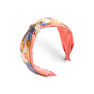 Colorful floral-patterned headband on a white background