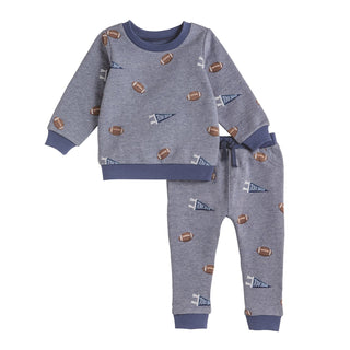 Children's blue pajama set with football pattern on a white background