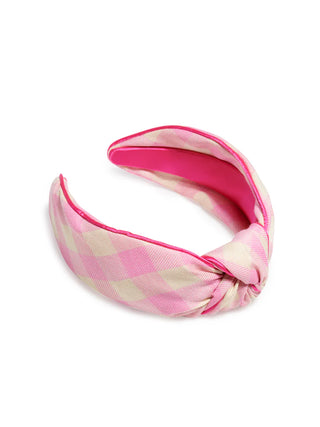 Pink and white checkered headband on a white background
