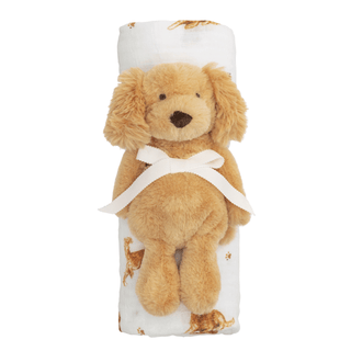 Plush dog toy with a white blanket featuring a pattern on a white background