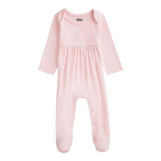 Pink baby onesie on a white background