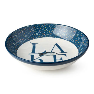 Decorative bowl with blue speckled rim and 'LAKE' text on a white background