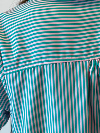 Close-up of a green and white striped shirt