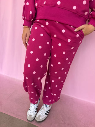 girl wearing a polka dot set 