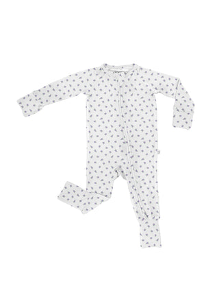 White baby onesie with black patterns on a white background