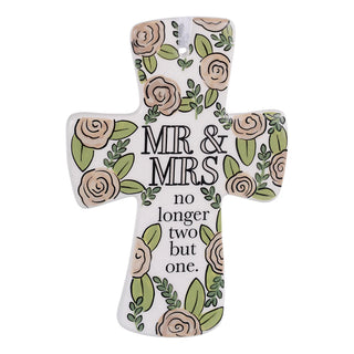 Decorative cross with floral design and text 'MR & MRS no longer two but one' on a white background