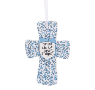 Decorative cross with blue floral pattern and 'For this child I have prayed' text on a white background