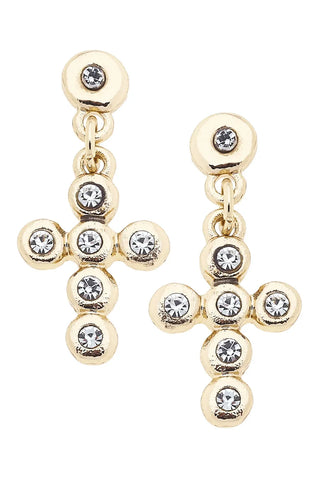 Gold earrings with clear gemstones on a white background
