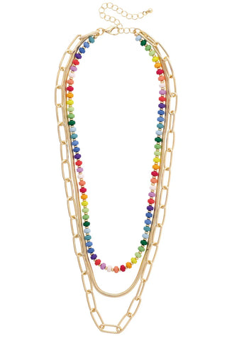Multicolored beaded necklace with gold chain on a white background