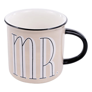 Beige mug with 'MR.' text on a white background