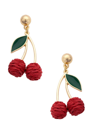 Cherry-themed earrings with red fruit and green leaves on a white background