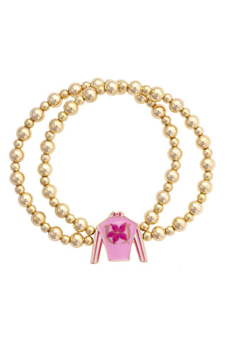 Pearl bracelet with a pink charm on a white background