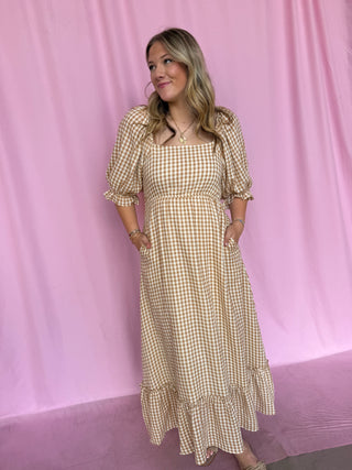 girl wearing gingham dress