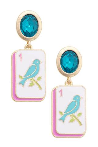 A pair of gold-tone drop earrings featuring oval turquoise-blue faceted gemstones and rectangular white enamel drops decorated with a light blue bird on a green branch and a pink side border.