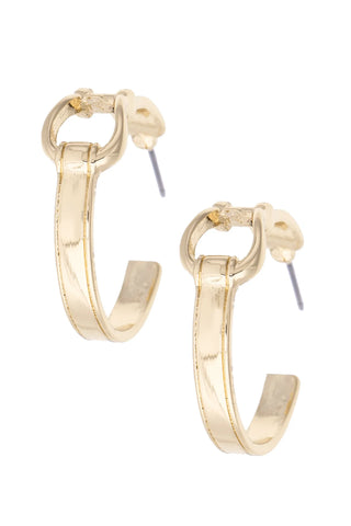 Gold hoop earrings on a white background