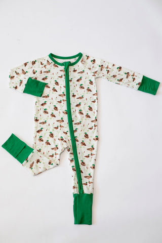 Children's onesie with bird pattern and green trim on a white background
