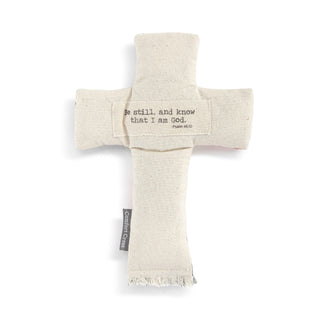 Fabric cross with text on a white background