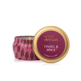 Capri Blue Artisan Tinsel & Spice candle with gold lid on a white background