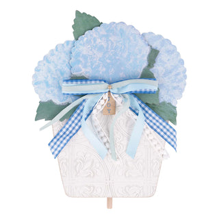 Decorative fan with blue flowers and a bow on a white background