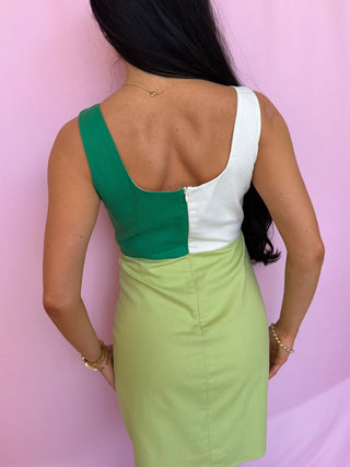 woman wearing green dress 