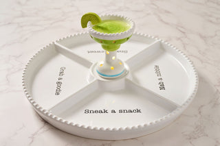 White pet toy with compartments on a marble surface
