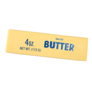 Butter stick with yellow wrapper and blue text on a white background